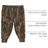 image:imageCarhartt Boys Fleece Logo Sweatpant  CottonBlend Fleece  Designed With An Elastic Waistband And Adjustable  Cozy WarmthMossy Oak Bottomland
