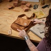 image:imageCarhartt Womens Crossbody Bag Durable Adjustable Shoulder Bag With Flap Over Snap ClosureCarhartt Brown